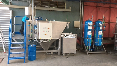 Water treatment filtration skid installed alongside a wash system